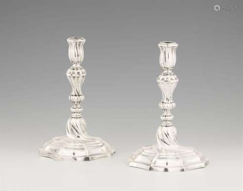 A pair of Celle silver candlesticks