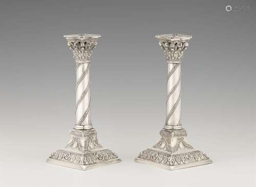 A pair of Louis XVI Minden silver candlesticks