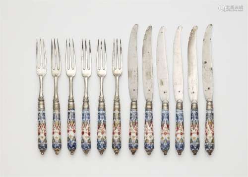 An Augsburg silver cutlery set with Meissen porcelain handle...
