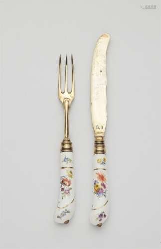 An Augsburg silver gilt knife and fork with porcelain handle...