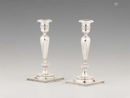 A pair of Warsaw silver candlesticks