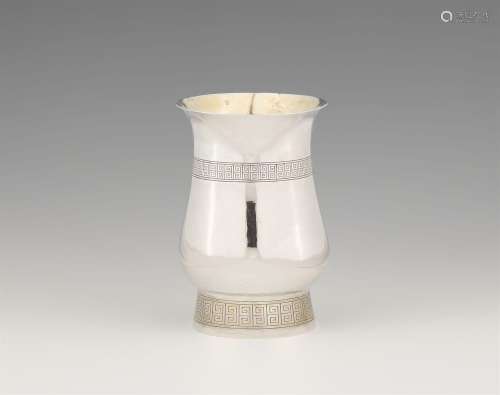 An elegant parcel gilt silver vase
