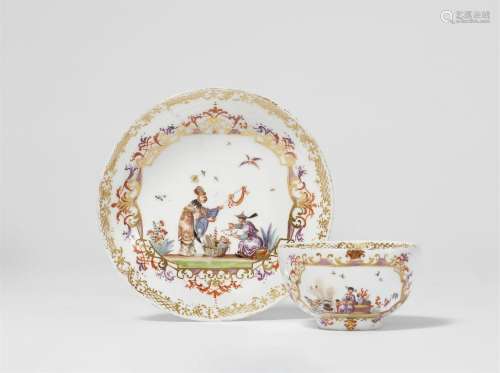 A Meissen porcelain tea bowl and saucer with Chinoiseries