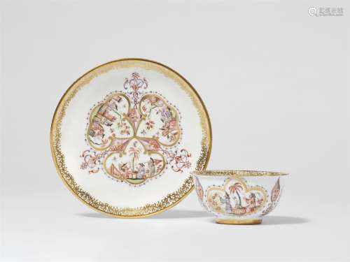 A Meissen porcelain tea bowl and saucer with Chinoiserie dec...