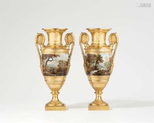 A pair of porcelain amphora vases with hunting motifs