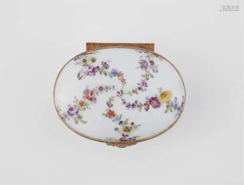 A Meissen porcelain snuff box with flower and landscape moti...