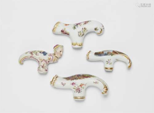 Four porcelain walking cane toppers
