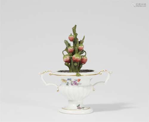 A Meissen porcelain vase with a strawberry bush motif