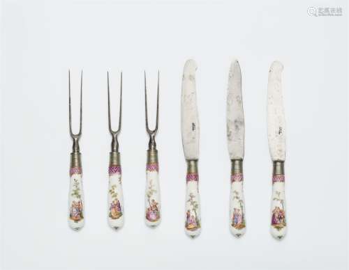 Three forks and three knives with porcelain handles