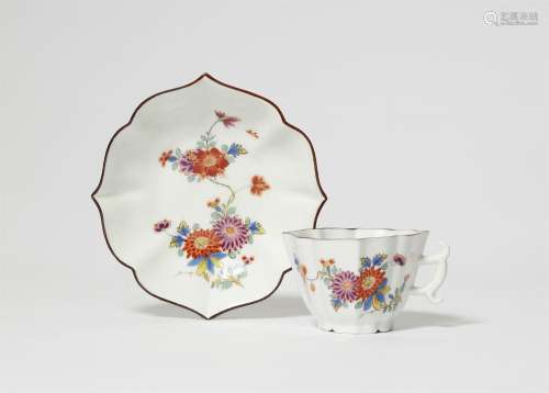 A Meissen porcelain cup and saucer with Chinoiserie decor