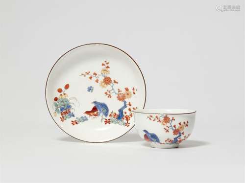 A Meissen porcelain tea bowl and saucer with quail decor