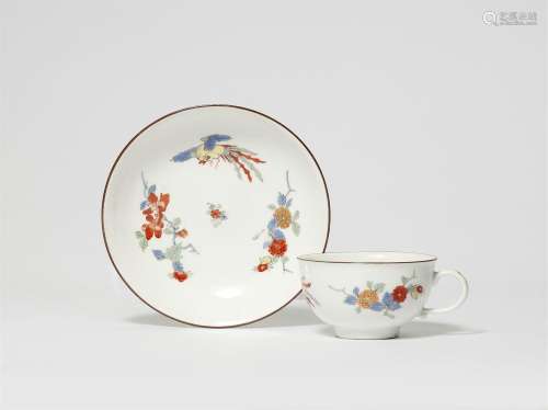 A Meissen porcelain cup and saucer with Hôô bird and chrysan...