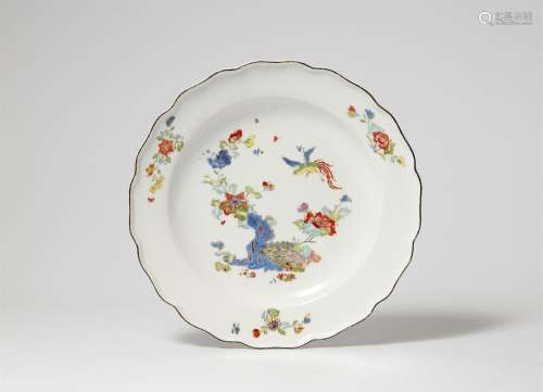 A Meissen porcelain plate with Hôô birds, peonies and rice s...