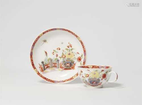 A Meissen porcelain cup and saucer with Chinoiserie fence an...