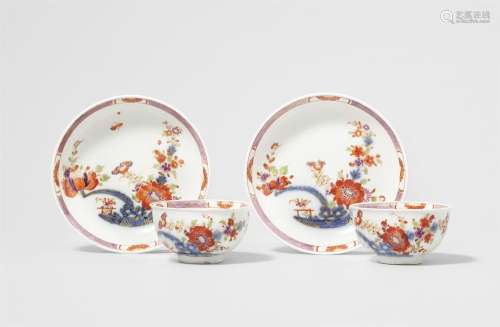 Two Meissen porcelain tea bowls and saucers with "india...
