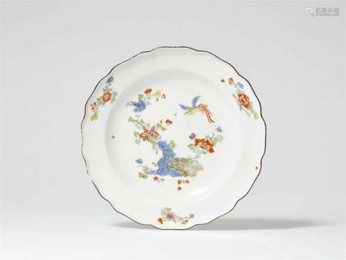 A Meissen porcelain plate from a service with hôô-birds, ric...