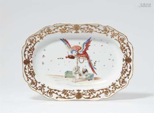 A large Meissen porcelain platter with a parrot and a Bologn...