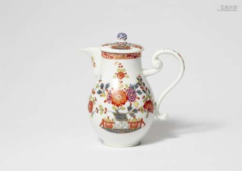 A Meissen porcelain milk jug with Chinoiserie table decor