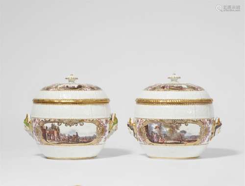 A pair of Meissen porcelain tureens with finely painted land...