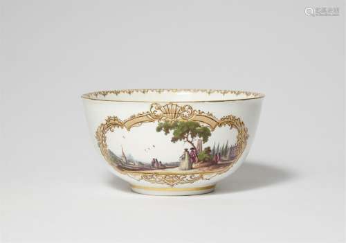 A Meissen porcelain slop bowl with elegant couples