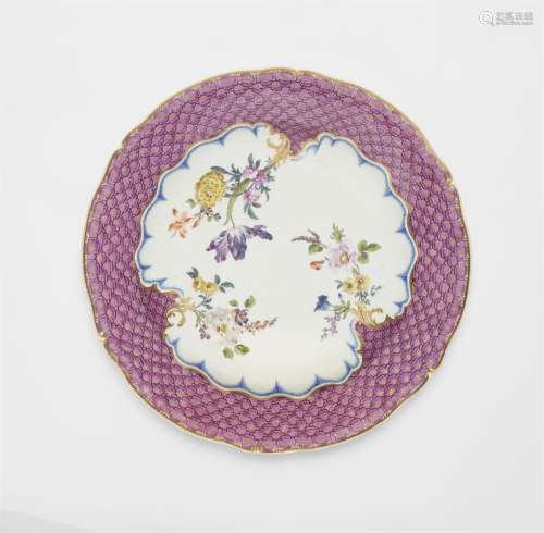 A Meissen porcelain plate with scale-pattern decor