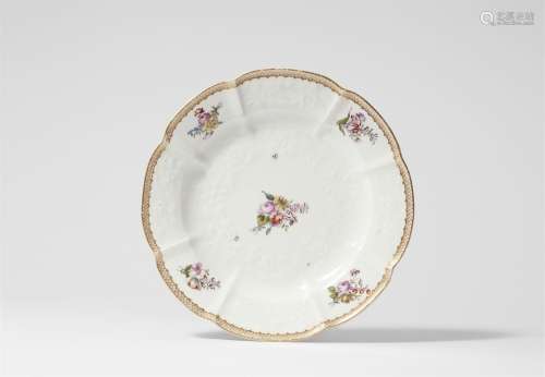 A Meissen porcelain plate with German flower decor
