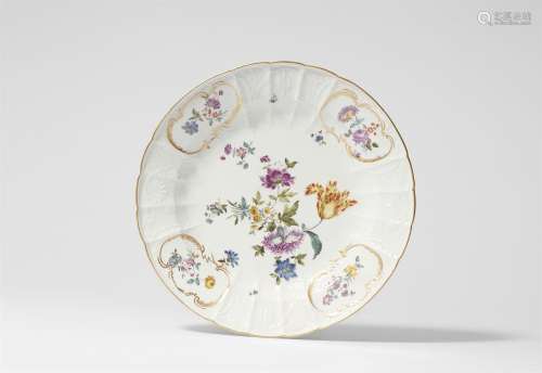 A Meissen porcelain plate from a service with German flower ...