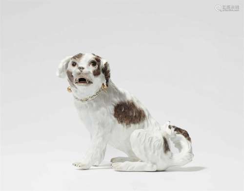 A Meissen porcelain figure of a spaniel dog