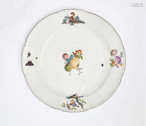 A Meissen porcelain dish painted with a fruit still life and...