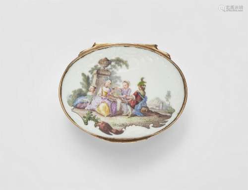An oval porcelain snuff box with Watteau style scenes