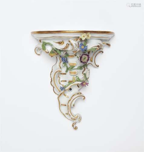 A Meissen porcelain wall bracket with rocailles and flower a...