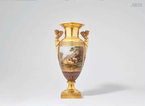 A Parisian porcelain amphora vase with herm handles