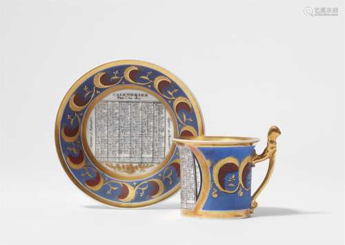 A Parisian porcelain cup and saucer "Calendrier pour l`...