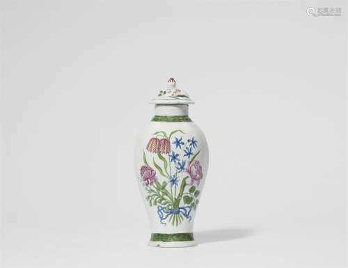 A rare Ansbach faience vase and cover