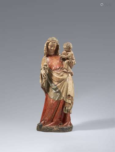 A stone figure of the Virgin and Child, presumably Burgundy,...