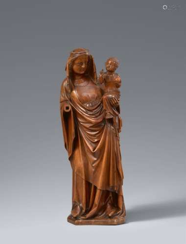 A French carved boxwood figure of the Virgin and Child, circ...