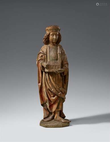 A high relief figure of a Saint with a church model, probabl...