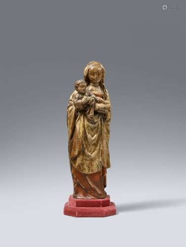 An early 16th century Mechelen carved figure of the Virgin a...