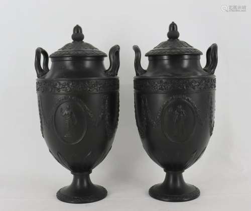 A Pair of Wedgwood Basalt Lidded Porcelain Urns.