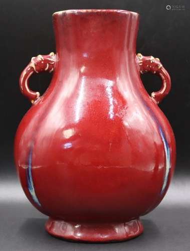 Chinese Sang de Beouf Vase with Elephant Handles.