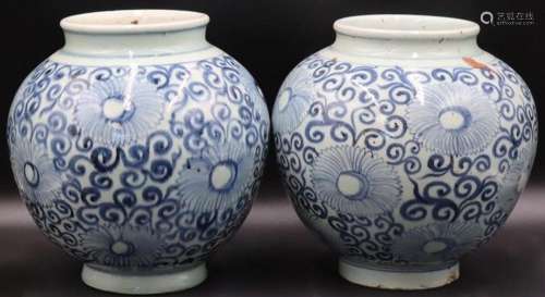 Pair of Chinese Blue and White Floral Jars.