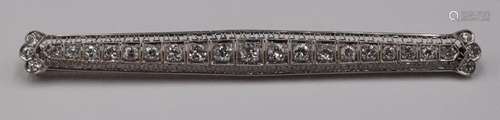 JEWELRY. Art Deco Platinum and Diamond Bar Pin.