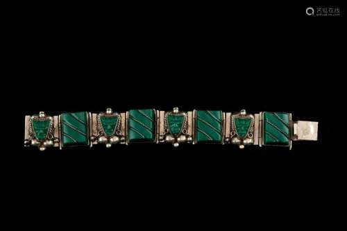 A Mexican sterling link bracelet with Aztec style green ston...