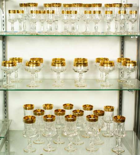 (Lot of 49) Suite of gilt rimmed cut glass stemware