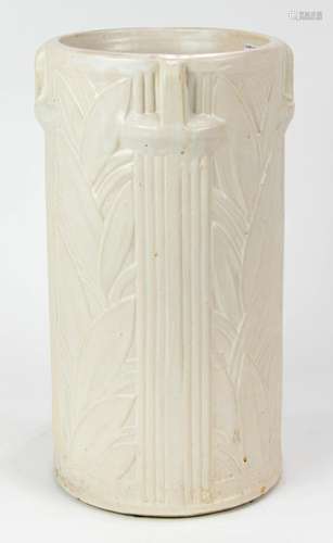 McCoy pottery matt white umbrella stand, molded in relief wi...