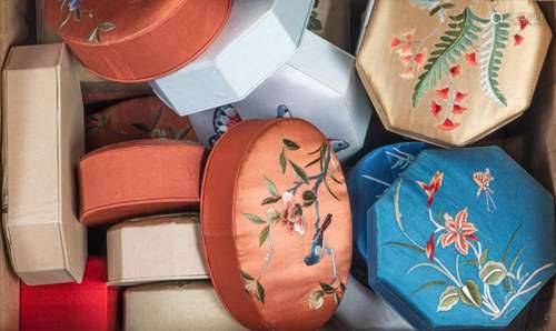 (Lot of 21) Chinese embroidered fabric lined boxes in variou...