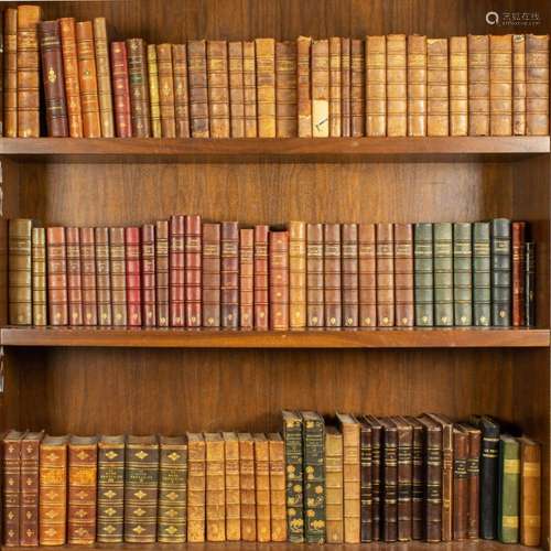 Three shelf library of vintage French leather volumes on the...