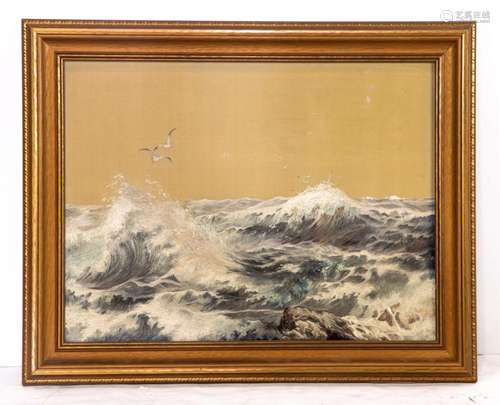 A framed embroidery of a seascape