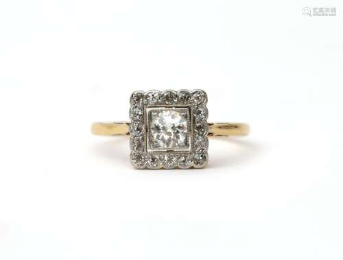 An 18 karat gold and platinum Art Deco diamond cluster ring....