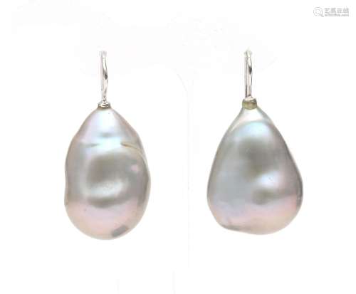 A pair of 14 karat white gold pearl earrings. Featuring a pa...